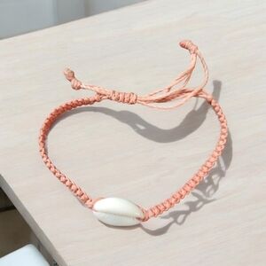 Orange shell woven bracelet
